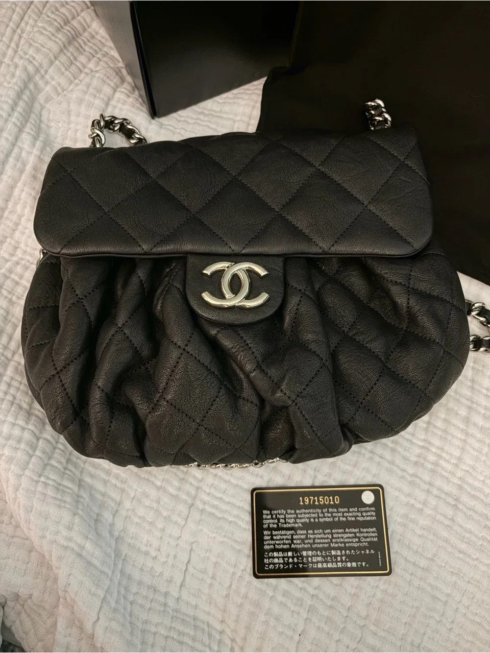 CHANEL Black Quilted Leather Small Flap Crossbody with Silver Chain